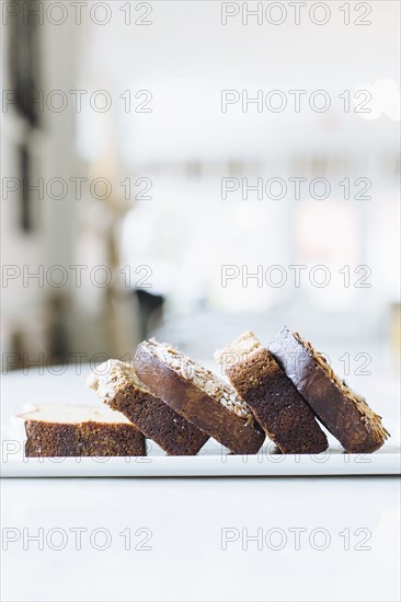 Close up of sliced coffee cake on cafe counter