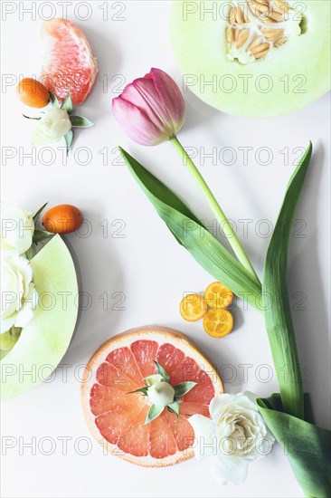 Flowers and sliced fruit