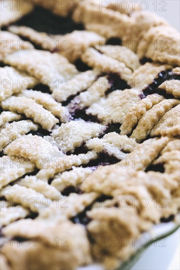 Close up of blueberry pie with lattice crust