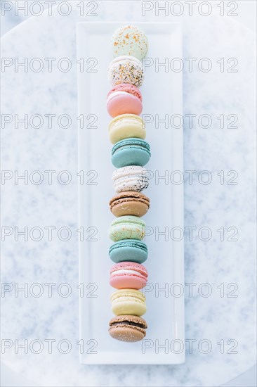 Overhead view of variety of macaroon cookies