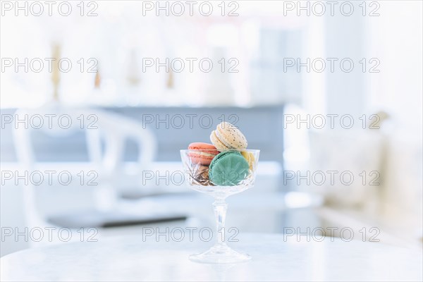 Variety of macaroon cookies in glass