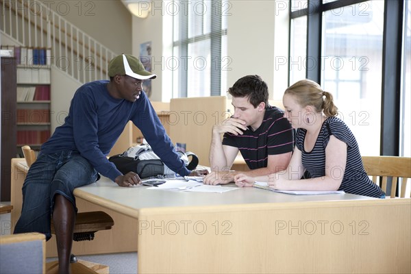 Students working together in library