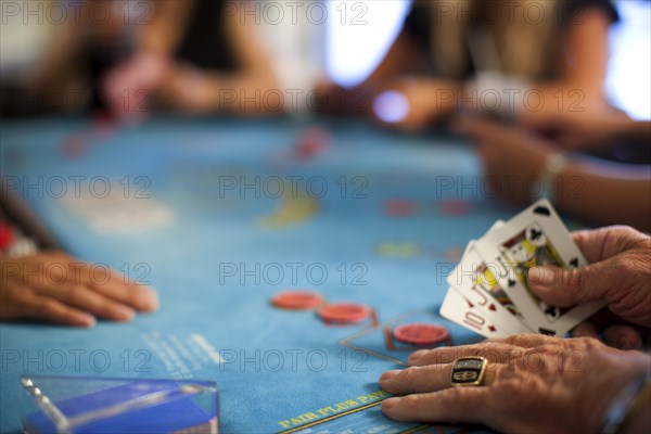 People playing poker in casino