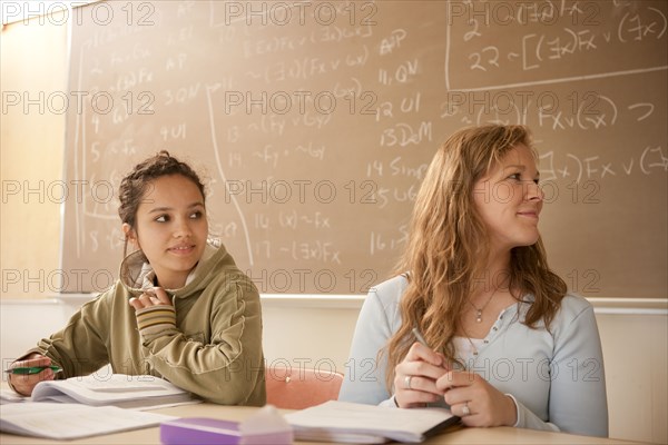 Students studying in classroom