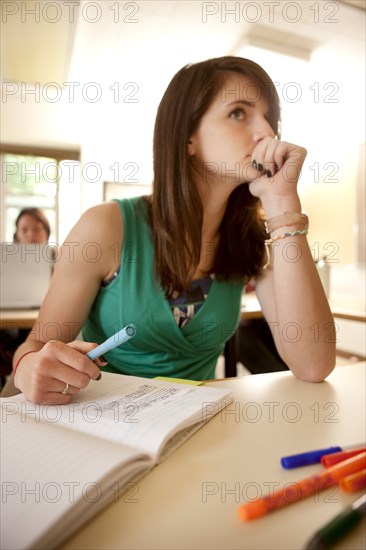 Students studying in classroom