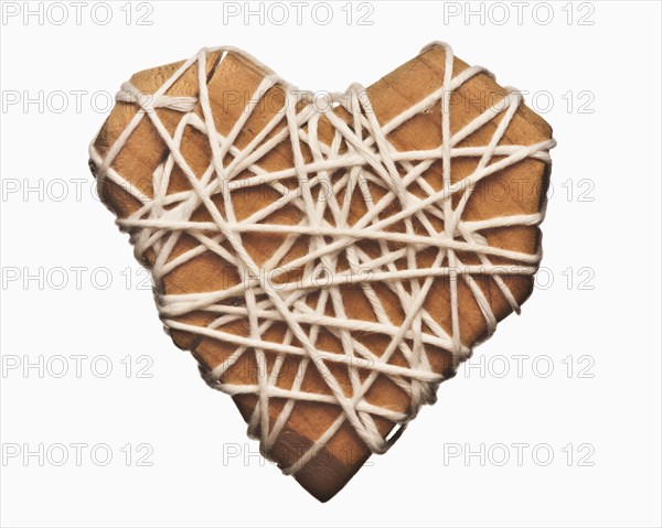 Wooden heart wrapped in string