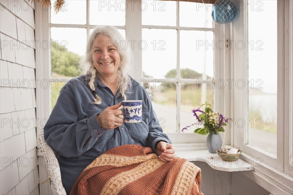 Caucasian woman drinking coffee