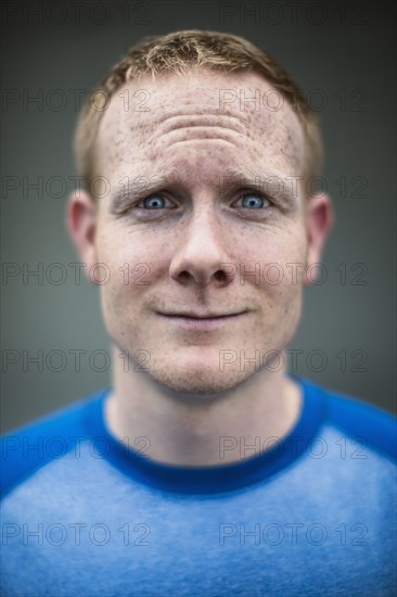 Close up of Caucasian man making a face