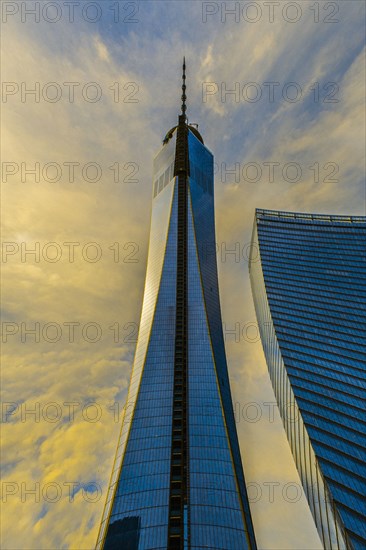 Urban skyscraper and cloudy sky