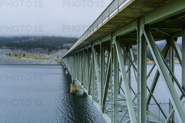 Bridge spanning river