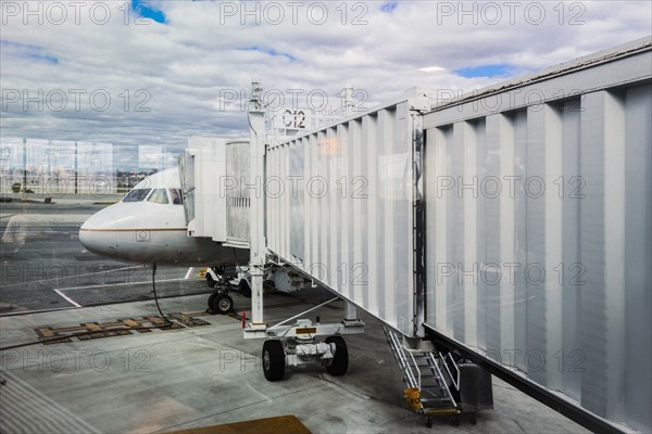 Walkway to airplane on runway