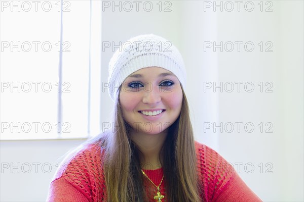 Caucasian student smiling in class