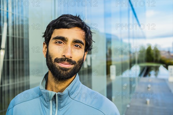 Portrait of smiling Indian man with beard