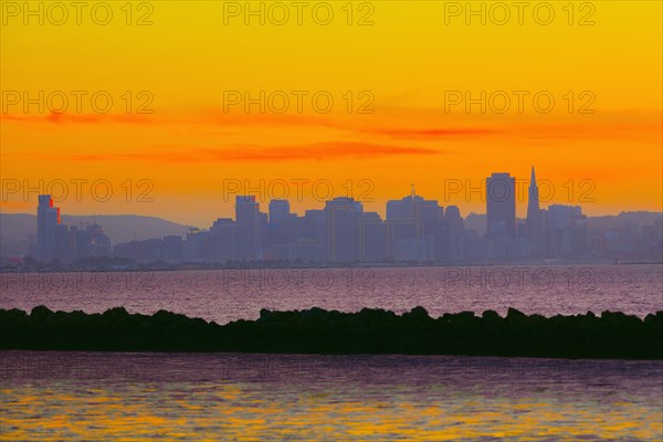 Colorful sunset sky over San Francisco city skyline