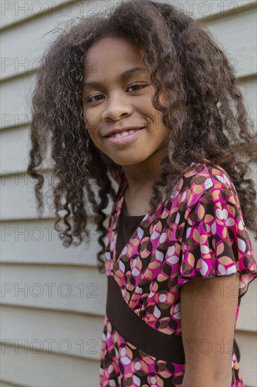 Pacific Islander girl smiling outdoors