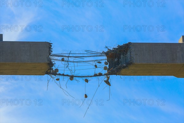 Close up of deteriorating concrete span under construction