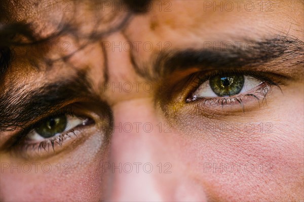 Close up of eyes of Hispanic man