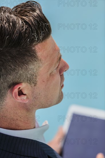 Caucasian businessman using digital tablet