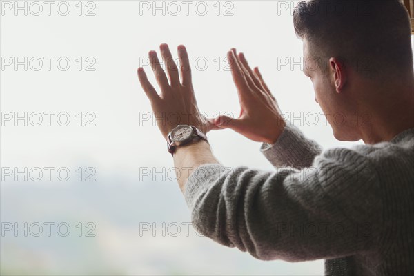 Caucasian businessman framing with hands