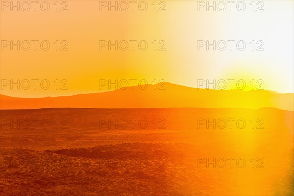 Sunset over desert landscape