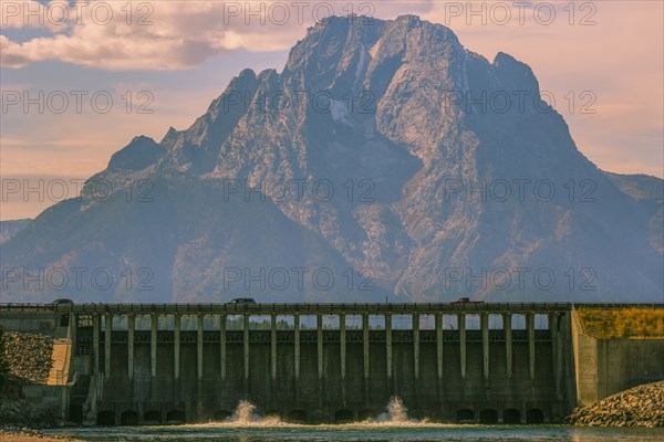 Mountain and dam in remote landscape