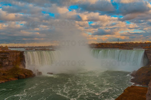 Niagara Falls mist under cloudy sky