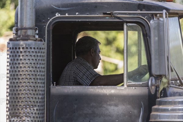 Caucasian man driving truck