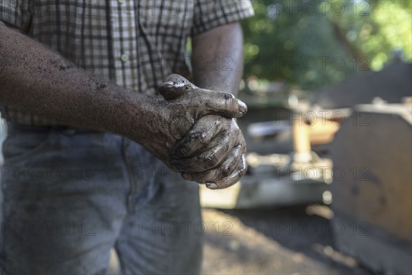 Greasy hands of Caucasian man