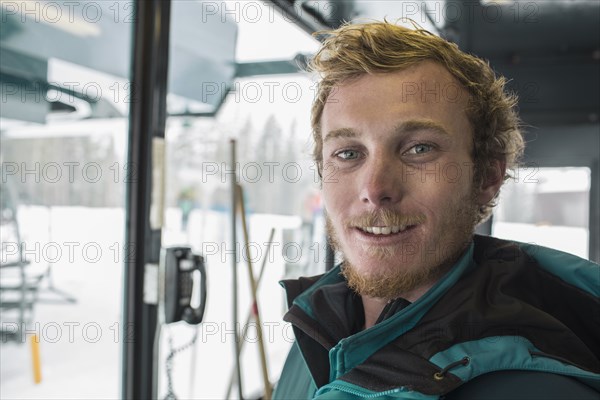 Portrait of smiling Caucasian man at winter resort