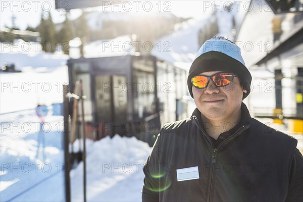 Portrait of smiling man outdoors in snow