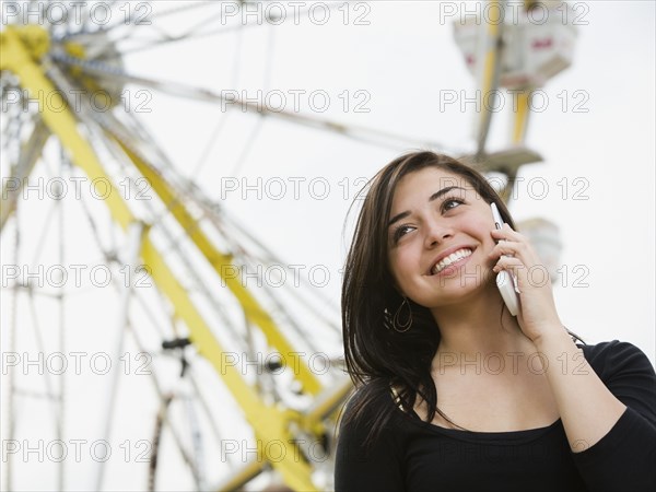 Mixed Race girl talking on cell phone