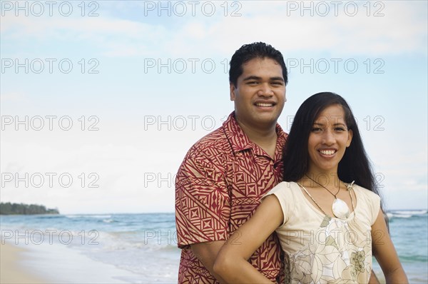 Pacific Islander couple at beach