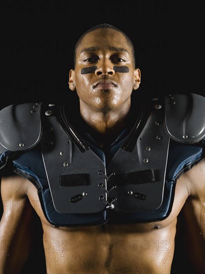 African football player wearing protective pads