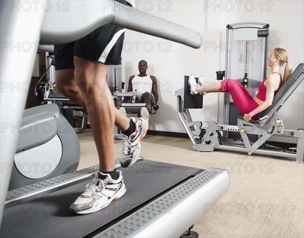 People exercising in health club