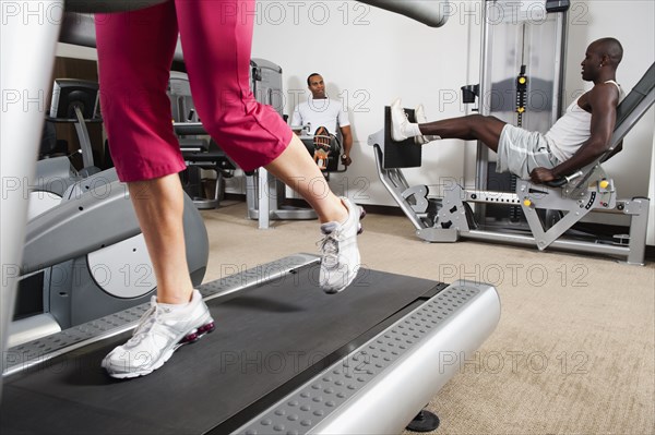 People exercising in health club