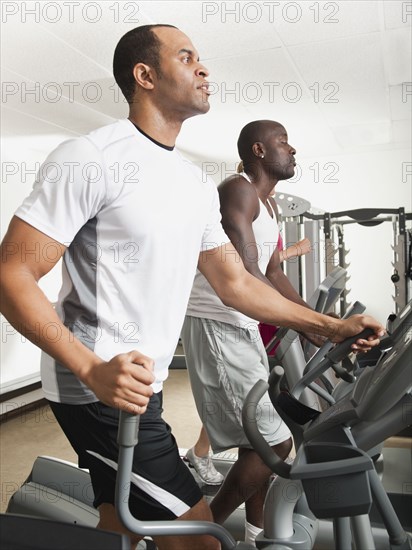 People exercising in health club