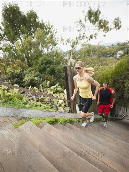 People running up stairs for exercise