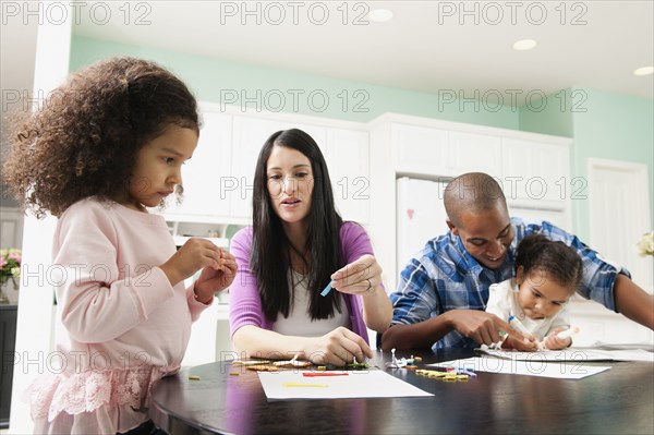 Family doing arts and crafts together