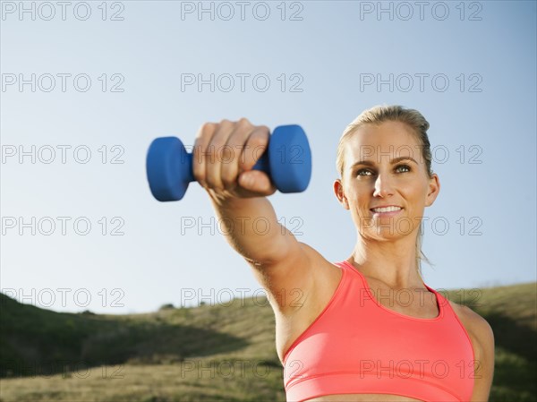 Caucasian woman exercising outdoors