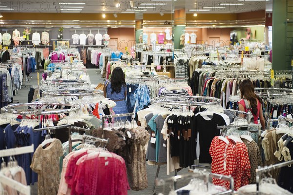 Women shopping in clothing store