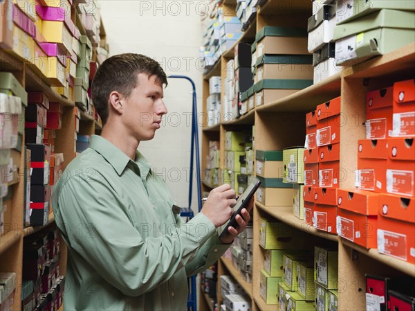 Caucasian man working in stockroom