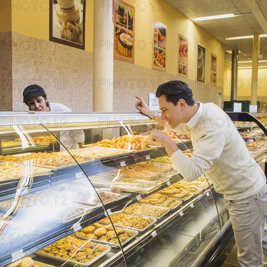 Customer ordering at restaurant counter