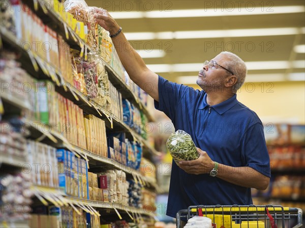 African American man shopping in grocery store