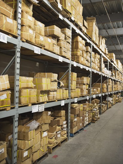 Shelves of boxes in textile factory