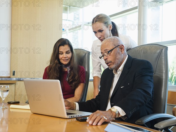 Business people working on laptop