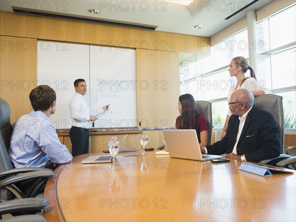 Business people talking in meeting