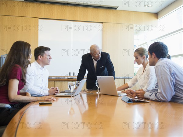 Business people talking in meeting