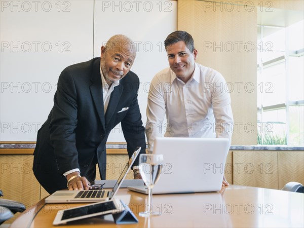 Businessmen talking in meeting