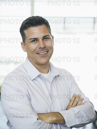 Caucasian businessman smiling