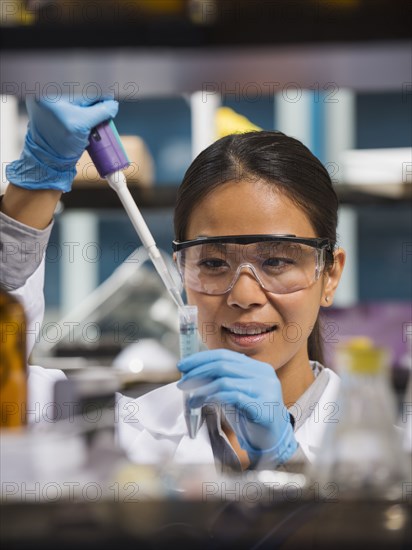 Japanese scientist working in laboratory